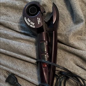 Curling iron that does all of the work for you!
